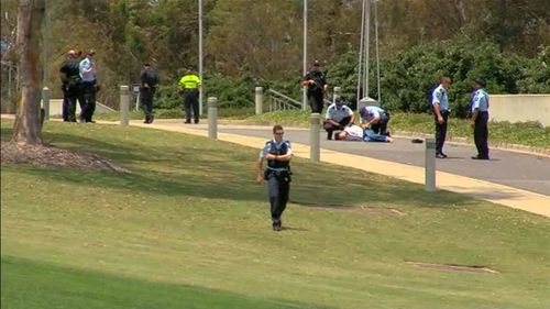 Australian Federal Police closed the road surrounding Parliament House while the threat remained. (9NEWS)