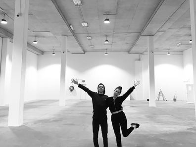 Argylica and Will Conditsis pose in the brand's first warehouse space.