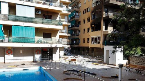 Explosion at Spain apartment block kills one, injures 17