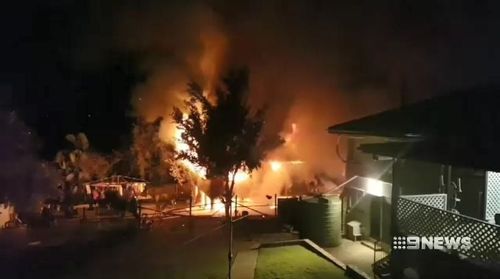 A group of Brisbane teenagers saved their neighbour from her burning home overnight after the property burst into flames. Picture: 9NEWS.