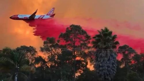 A large air tanker fights a bushfire in Bridgetown. The fire is now contained and controlled.