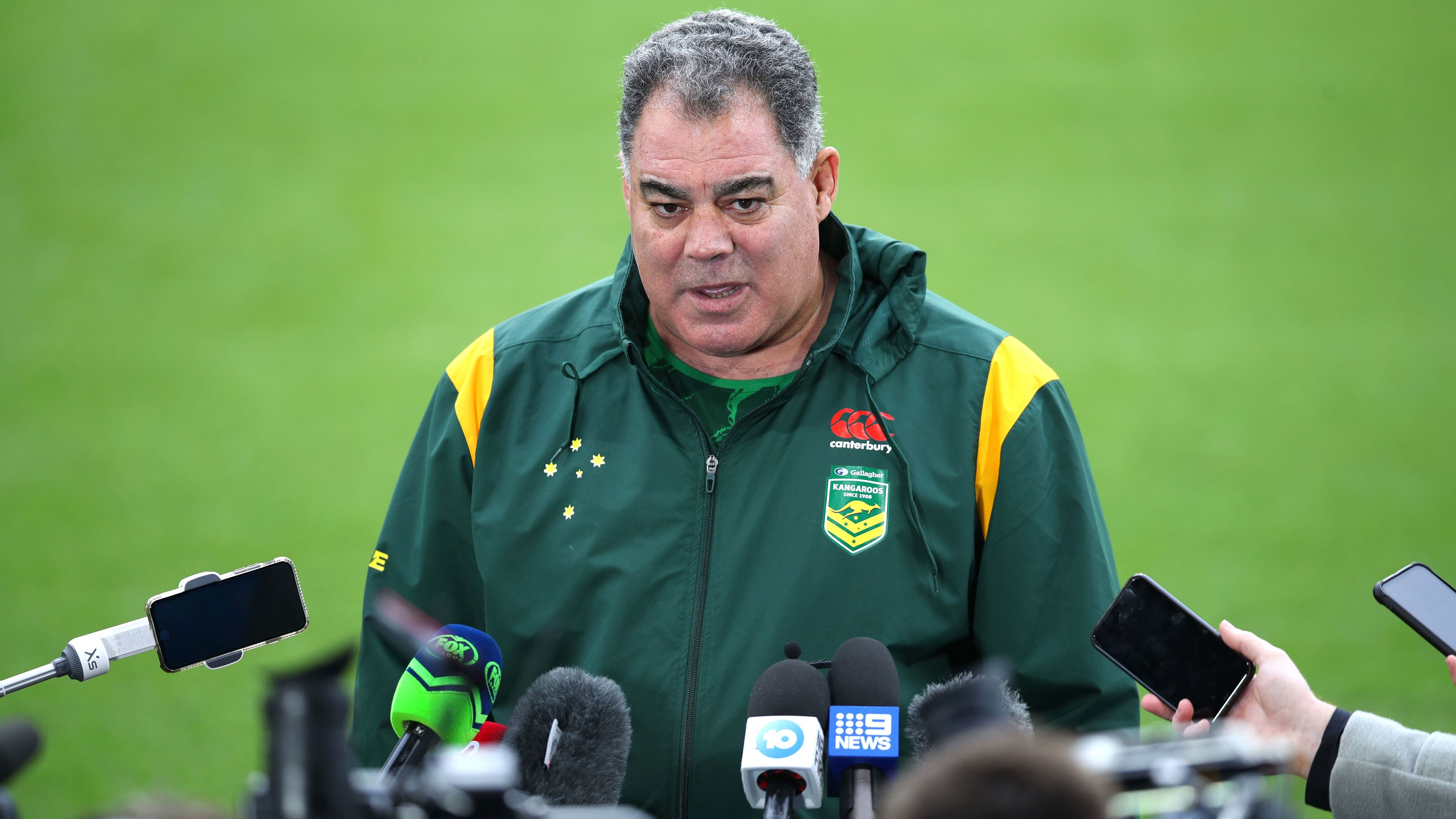Kangaroos coach Mal Meninga talks to the media. 