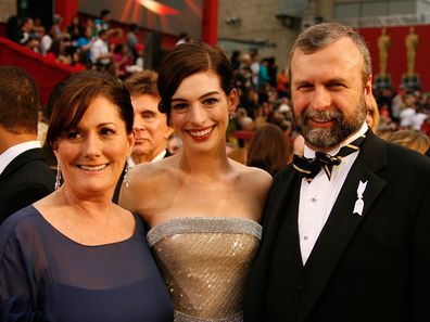 Anne Hathaway with her parents Kate McCauley and Gerard Hathaway at the 81st Annual Academy Awards on February 22, 2009 in Hollywood, California.  (Photo by Jeff Vespa/WireImage)