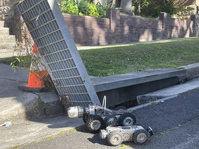The CCTV drain robots on the ground in Bondi searching drains for Tara.