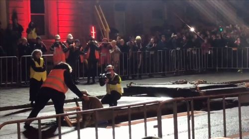 After three days sealed inside a steel container underneath a busy Hobart street, performance artist Mike Parr emerged without saying a word. Picture: 9NEWS