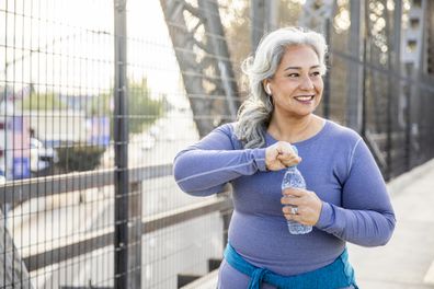 Older woman exercising. Older woman going on a walk.