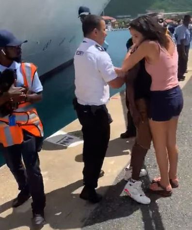 Randolph Donovan being thanked by a witness following the rescue, which saw the woman fall off the dock and into the water in her wheelchair