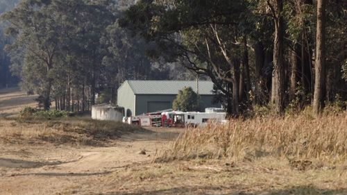 Mr Tull crashed on a private property at Woodstock, near the Kingiman fire which continues to burn west of Ulladulla.