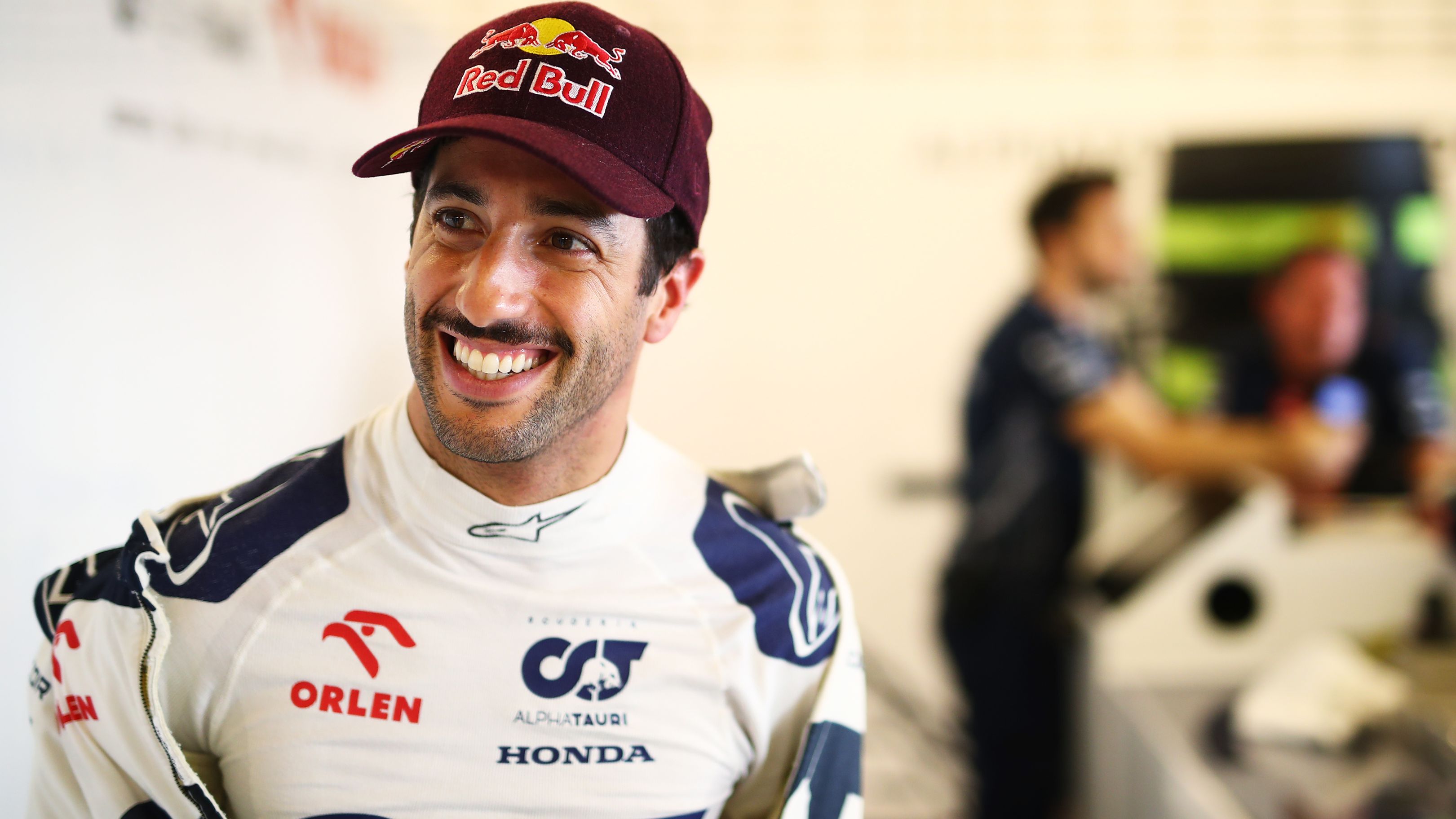 Daniel Ricciardo of Australia and Scuderia AlphaTauri prepares to drive in the garage during Formula 1 testing at Yas Marina Circuit on November 28, 2023 in Abu Dhabi, United Arab Emirates. (Photo by Joe Portlock/Getty Images)