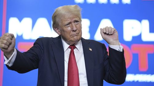 Republican presidential candidate former President Donald Trump dances as he wraps up a campaign rally, Saturday, July 27, 2024, in St. Cloud, Minnesota.