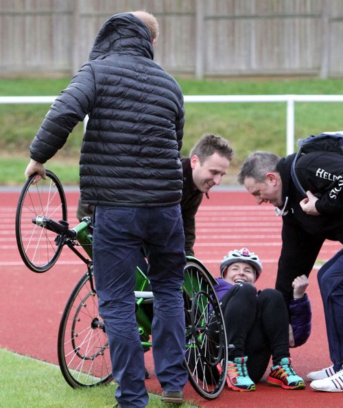 Cyclist Anna Pollock had been chatting with the prince when a gust of wind knocked her from her chair. (AAP)