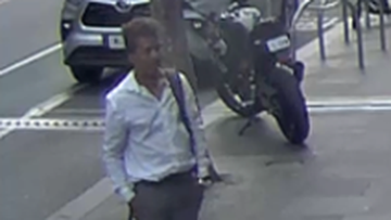 A man is sought by police after an alleged sexual assault at a tram stop in Docklands, Melbourne.