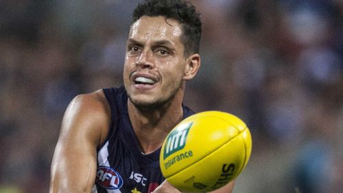 Dockers player charged with assault