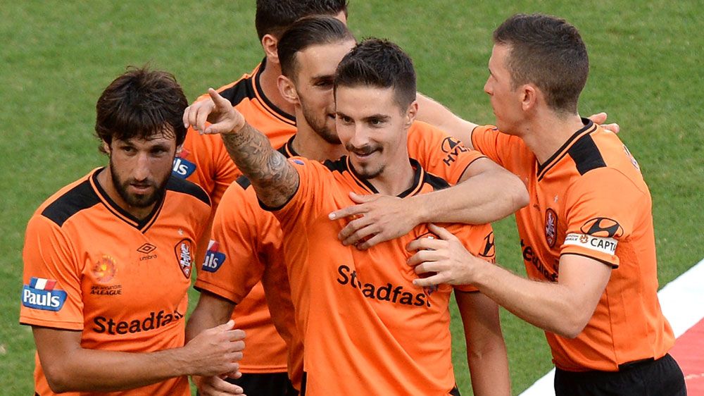 Roar to top of A-League after Glory win