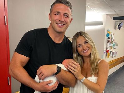 Sam Burgess and Lucy Graham with newborn daughter Robbie.