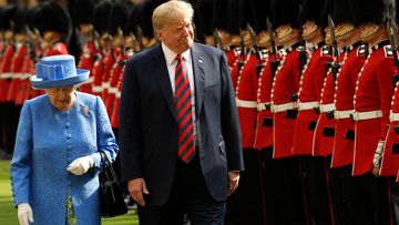 US President Donald Trump and Queen Elizabeth II inspect a Guard of Honour, at Windsor Castle in 2018.