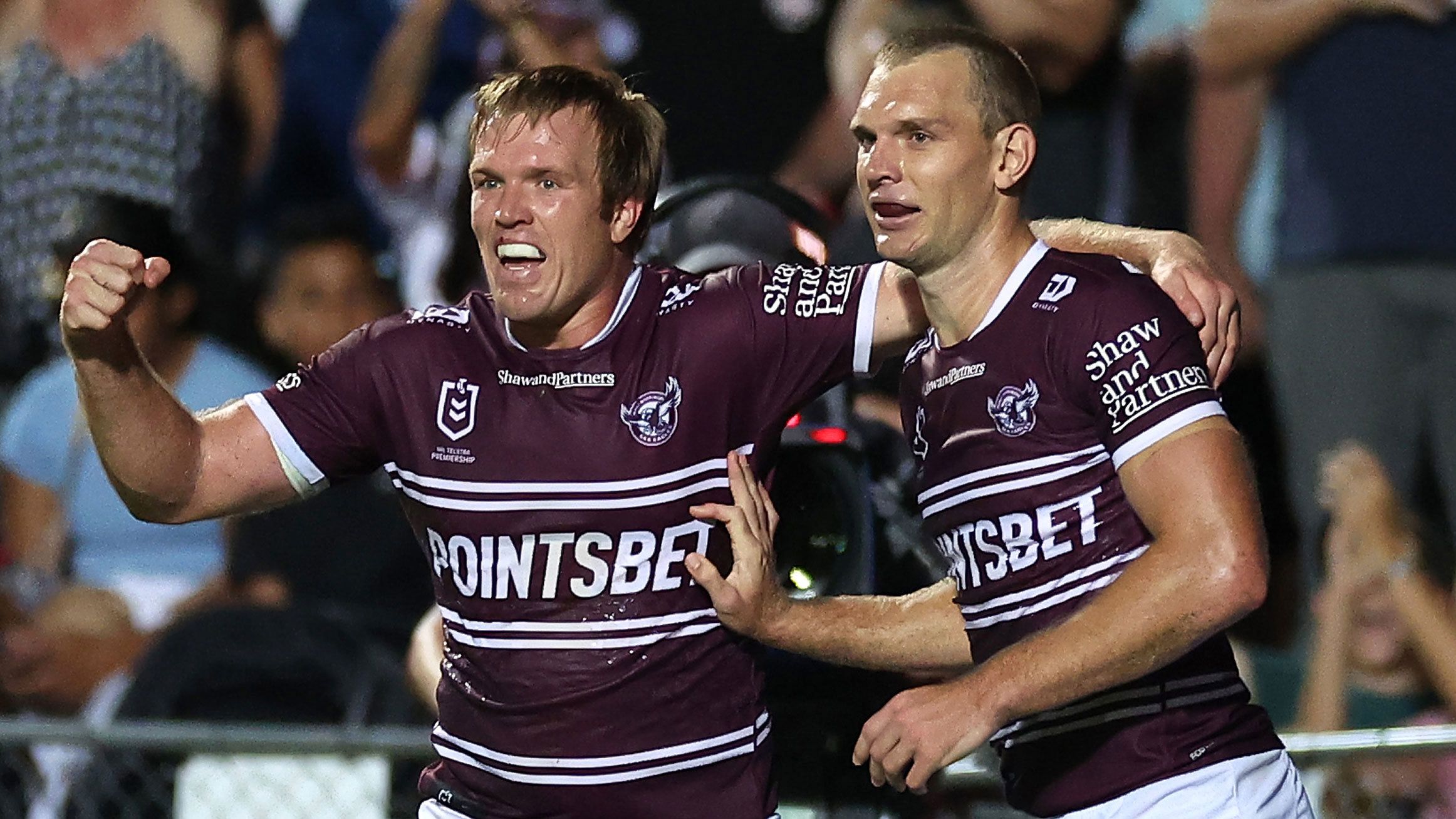 Tom and Jake Trbojevic celebrate a try for Manly against the Eels.
