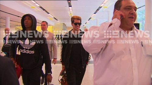 Yiannopoulos smiled for the cameras. (9NEWS)