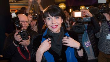 Politician and co-founder of Iceland's Pirate Party Birgitta Jonsdottir is mobbed by media as the election results are announced in Reykjavik, Iceland on October 25, 2016. (AFP)