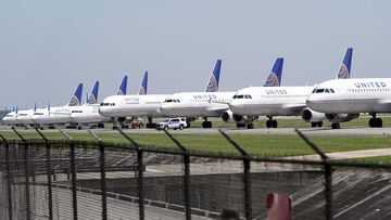 United Airlines planes are parked at George Bush Intercontinental Airport.