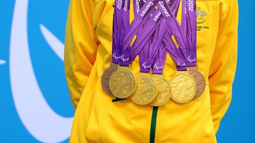 Ellie Cole with her four gold and two bronze medals for swimming at the London 2012 Paralympics.