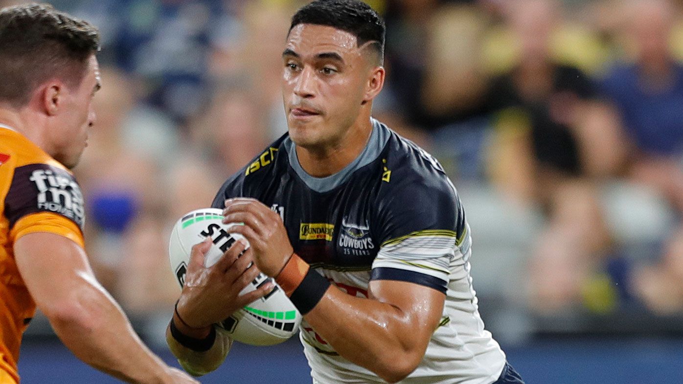 Valentine Holmes runs out for the first time officially for the Cowboys in the NRL. (AAP)