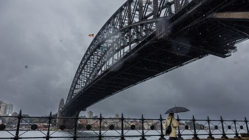 The Sydney Harbour Bridge during a rainy time successful August 2025.