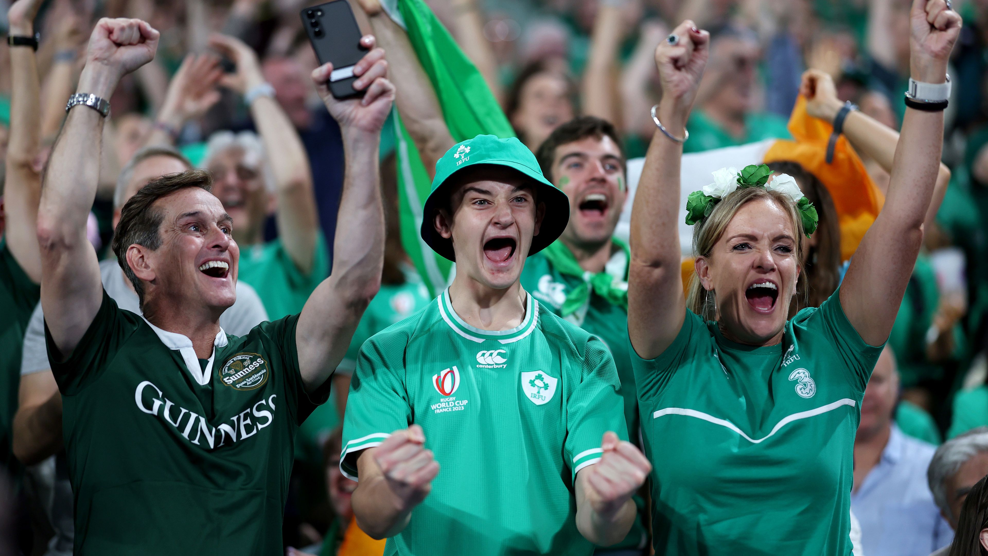 Ireland fans celebrate victory at Stade de France.