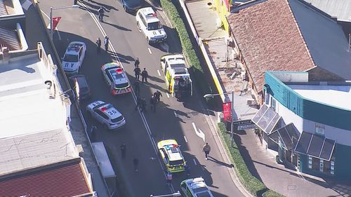 Three people have been injured in a shooting near Auburn train station in Sydney's south-west.