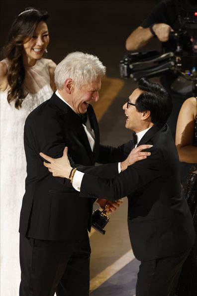 Harrison Ford and Ke Huy Quan embrace at the 95th Oscars Sunday, March 12, 2023,