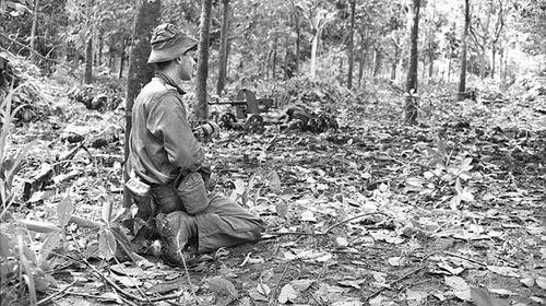 An Australian soldier during the battle of Long Tan in Vietnam on August 18, 1966. (AAP/Australian War Memorial)