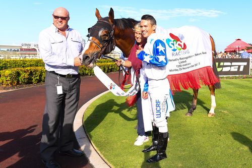 Jockey Matthew McGillivray poses for a photo with trainer Liam Birchley, who was part of the alleged text message chain. The jockey or horse pictured are in no way involved in the investigation. (AAP)