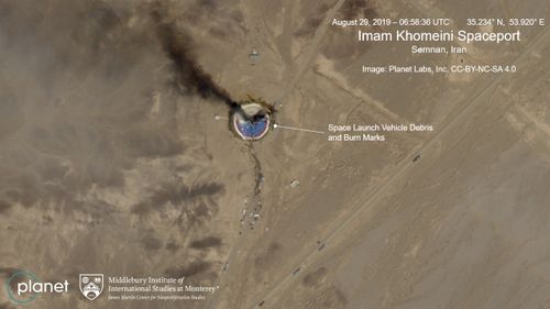 This Thursday Aug. 29, 2019, satellite image from Planet Labs Inc., shows a fire at a rocket launch pad at the  Imam Khomeini Space Center in Iran's Semnan province. (Planet Labs Inc, Middlebury Institute)
