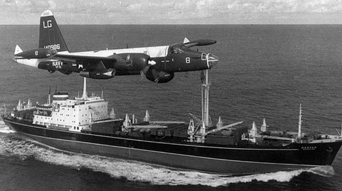 An American reconnaissance plane flies over a Russian ship bound for Cuba during the crisis. (Photo: AP).