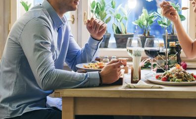 Couple having lunch at restaurant.