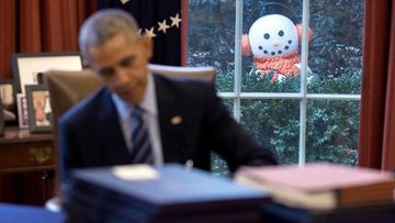 It may well be the most serious job in the world, but White House photographer Pete Souza has captured some of the lighter moments of Barack Obama's presidency, like this moment showing the president in the Oval Office seemingly being stalked by a snowman. (All photos: White House)
