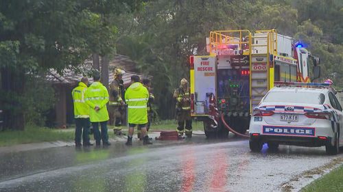 Four people are fighting for their lives after a serious house fire in Lawnton, Brisbane, Queensland