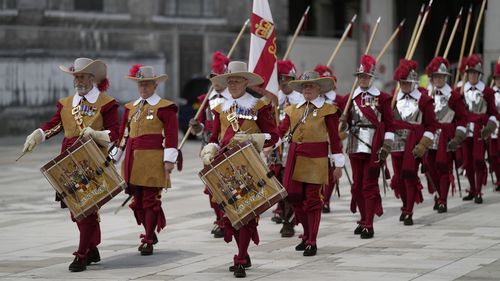 The City of London Company of Pikemen and Musketeers outside the Guildhall at the Thanksgiving Service for the Reign of Queen Elizabeth II at St Paul's Cathedral in London, Friday 3 June 2022 on the second of four days of Platinum Jubilee celebrations.  The events over a long holiday weekend in the UK are designed to celebrate the monarch's 70th anniversary.  (AP Photo/Alastair Grant)