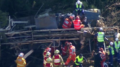 The driver was freed after being trapped for more than two hours. (9NEWS)