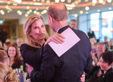 LEEDS, ENGLAND - MARCH 08: Prince Edward, Duke of Edinburgh and Sophie, Duchess of Edinburgh hug after her speech during the Community Sport and Recreation Awards on International Womens Day at Headingley Stadium on March 08, 2024 in Leeds, England. (Photo by Chris Jackson/Getty Images)