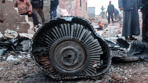 The plane was downed in Ma'saran village near Saraqeb city, in Eastern Idlib, Syria. (AAP)