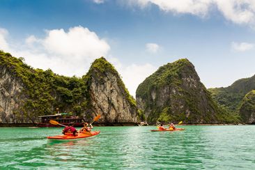 Two kayaks paddling in Halong Bay - Vietnam