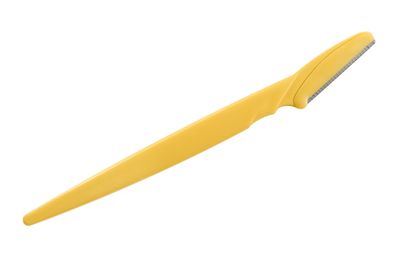 Yellow dermaplaning blade. Dermaplaning tool.