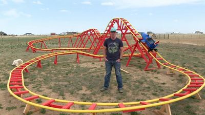 Dad builds rollercoaster for son in backyard