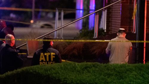 Law enforcement work the scene after two staff members of the Israeli Embassy in Washington were shot and killed outside the Capital Jewish Museum.