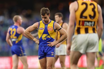 Jamie Cripps is dejected during his side&#x27;s loss to Hawthorn.