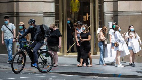 Shoppers wear masks on Castlereagh Street in Sydney.