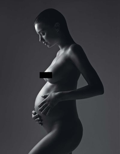 <p> A naked <strong>Miranda Kerr</strong> skips the hand bra in a 2010 W Magazine photoshoot to honour her first child Flynn, with then husband Orlando Bloom.</p>