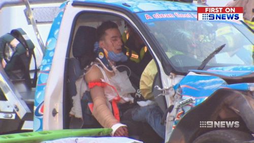 Witnesses say the 21-year-old had his arm out of the window when he crashed into the taxi. (9NEWS)