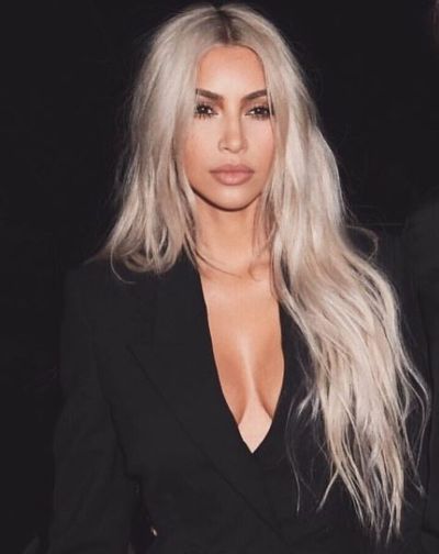 Somehow Kim has gone white blonde without killing her hair. Witchcraft. It's the only possible explanation.